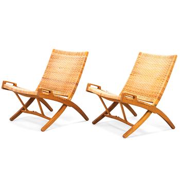 HANS J WEGNER, A pair of JH-512 folding chairs for Johannes Hansen, Denmark, early 1980s. Model designed in 1949.