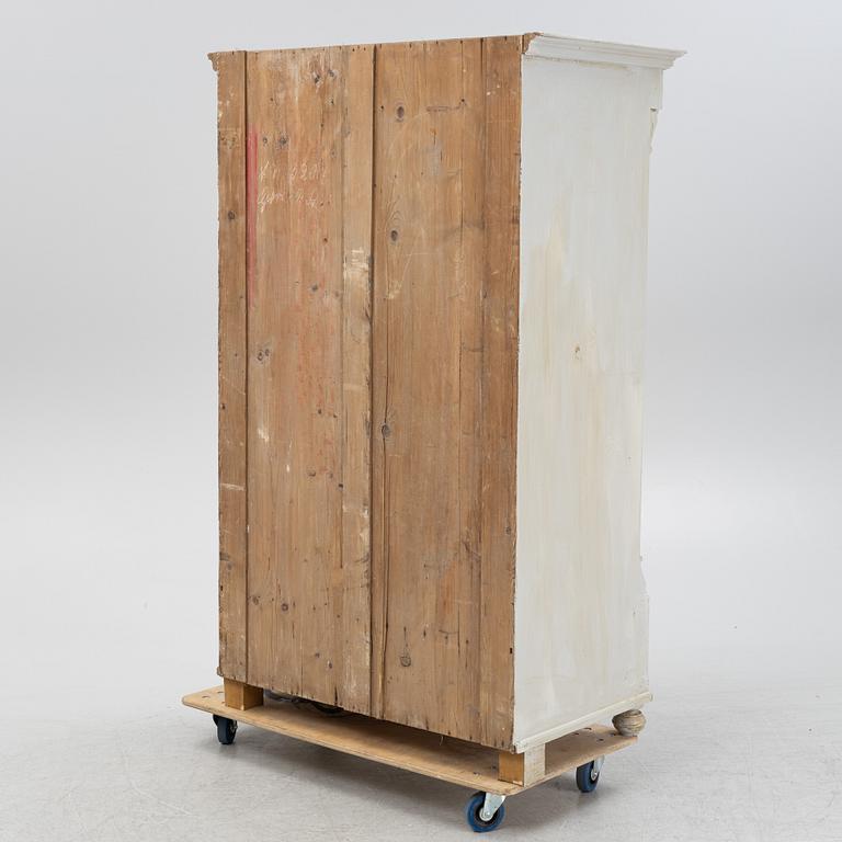 A painted wardrobe, early 20th Century.