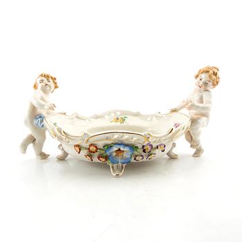 Bowl and candlesticks, a pair, Rococo style, Germany, first half of the 20th century, porcelain.