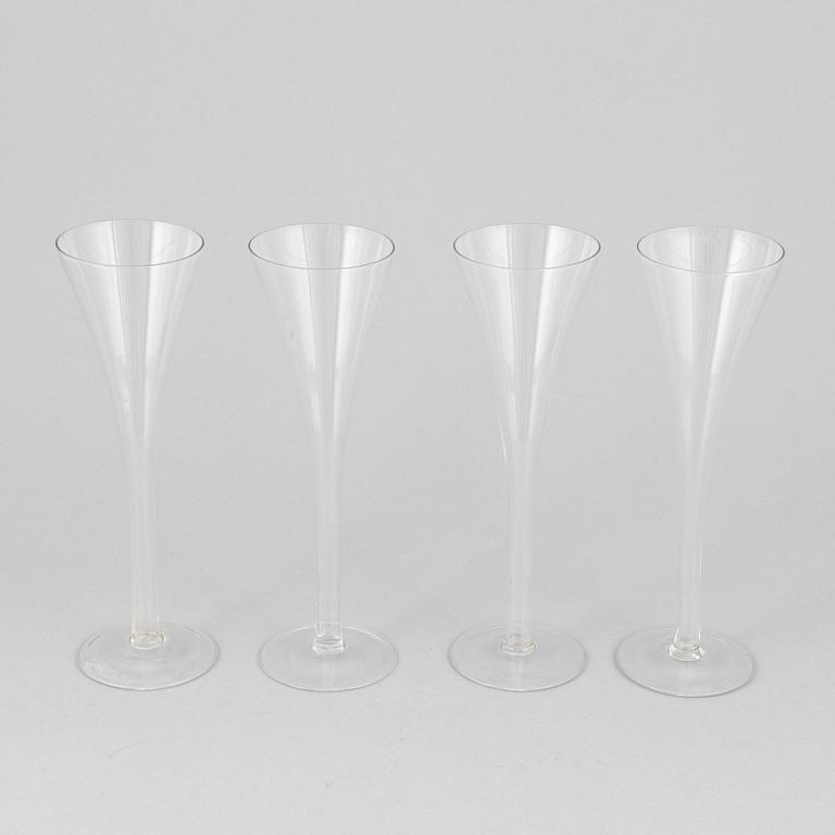 A set of four 19th century champagne flutes.