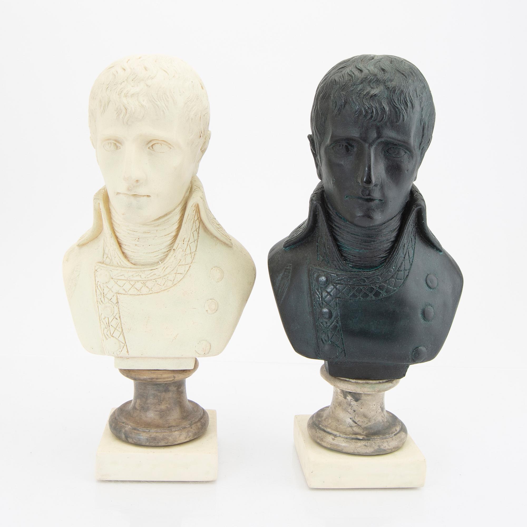 A pair of modern plaster statues of Napoleon.