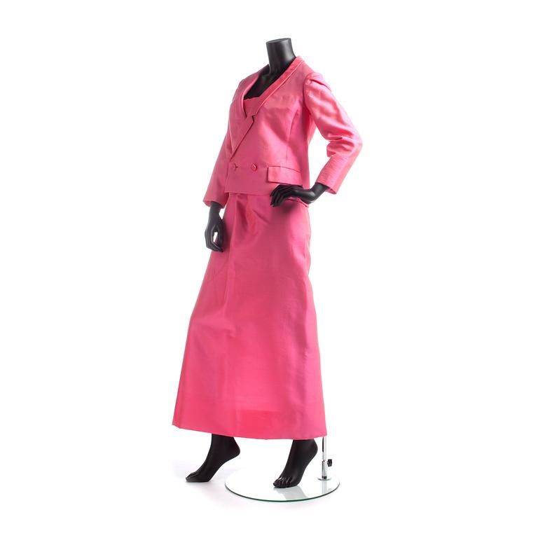 NINA RICCI, a pink silk evening dress with jacket and belt from the 1960s.