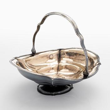 A parcel-gilt sweetmeat basket, Saint Petersburg 1851, master mark HH, Nikolai Nikitin or Henrik Hacklin.