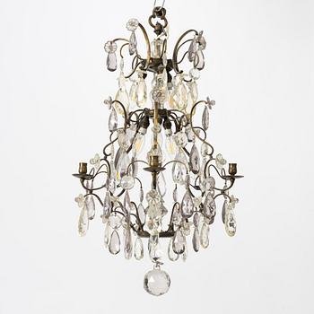 A Rococo style chandelier, early 20th Century.