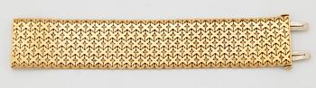 An 18K gold Tännler bracelet.