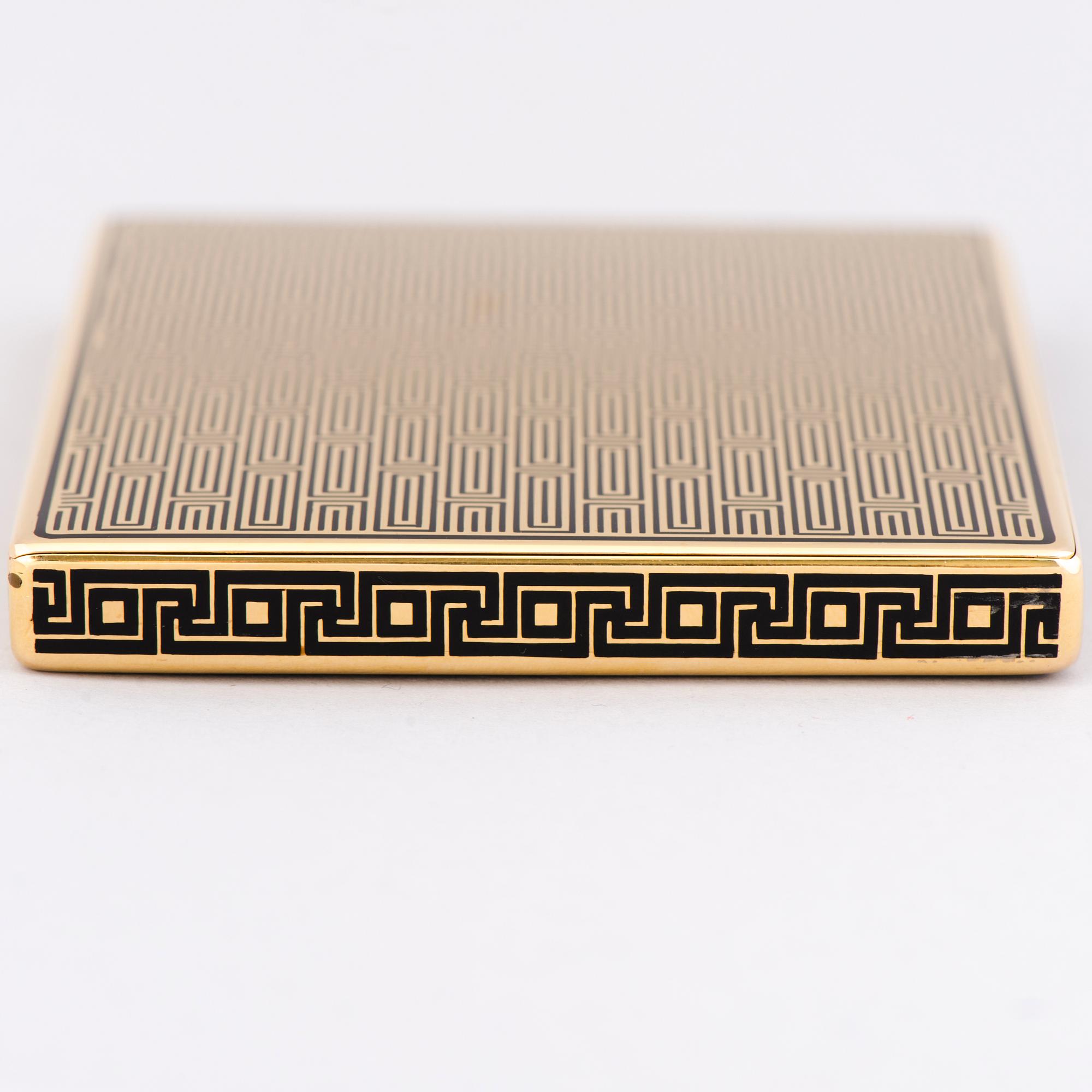A GOLD CASE, 18K gold, black enamel. France.