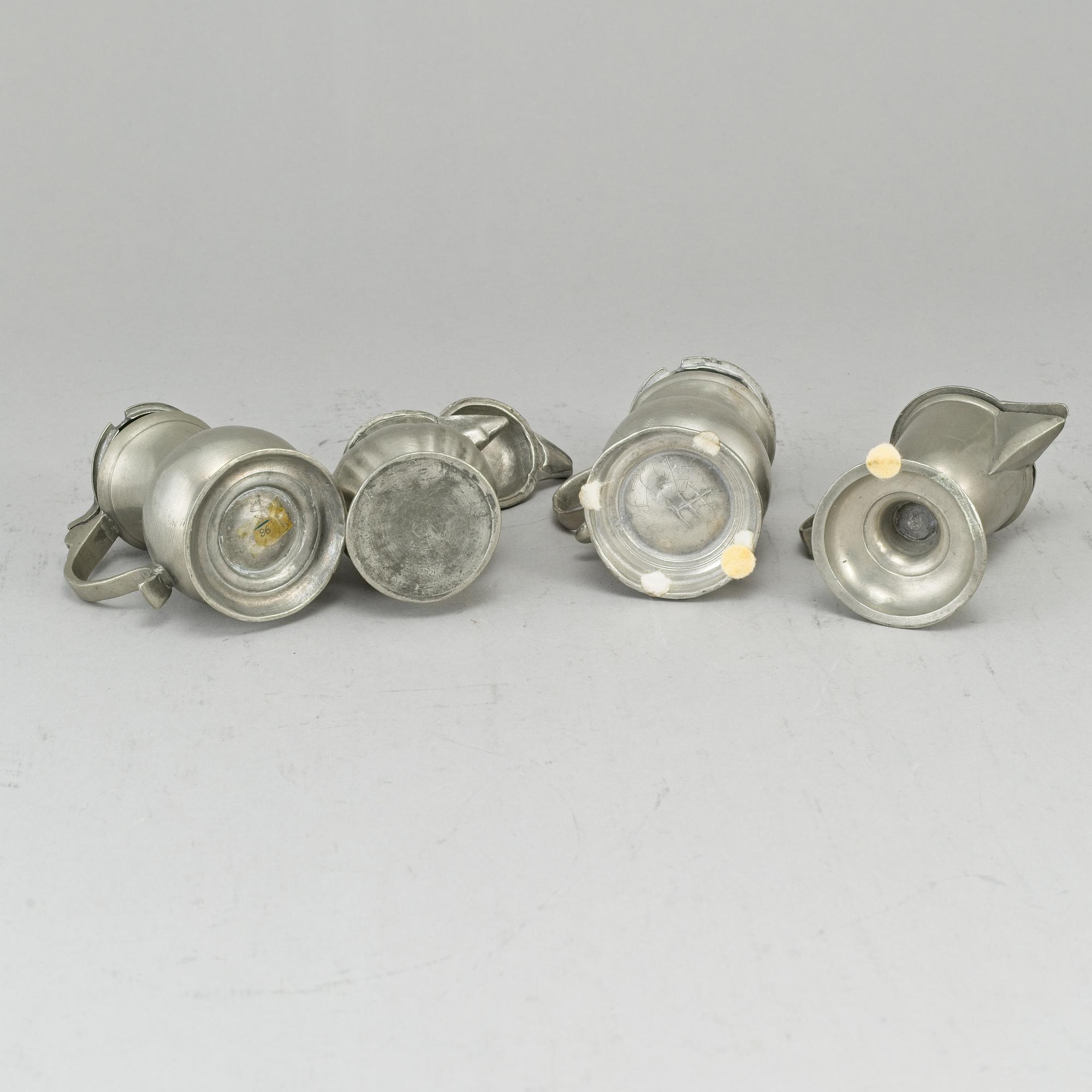 Eight pewter mustard pots, 18th/19th century.