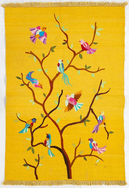 A hand-embroidered Kelim rug, c. 178 x 122 cm.