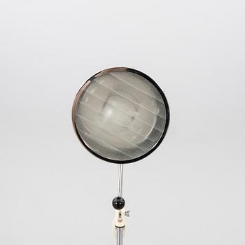 A mid 1900s industrial floor lamp.