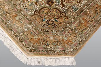 A rug, oriental silk, ca silk, ca 245 x 175 cm.