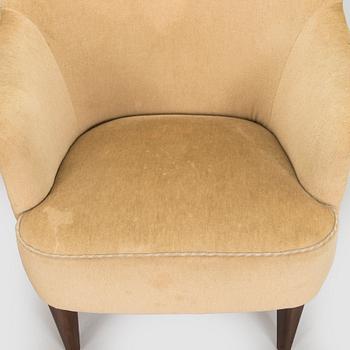 A mid-20th century armchairs.