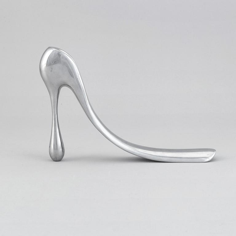 A metal shoe horn by Manolo Blahnik, 2000s.