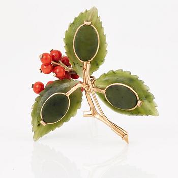 A corall and nephrite brooch.