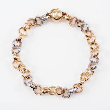 ARMBAND, 18K guld/vitguld samt mindre diamant, Per Borup. Total vikt ca 29 g.