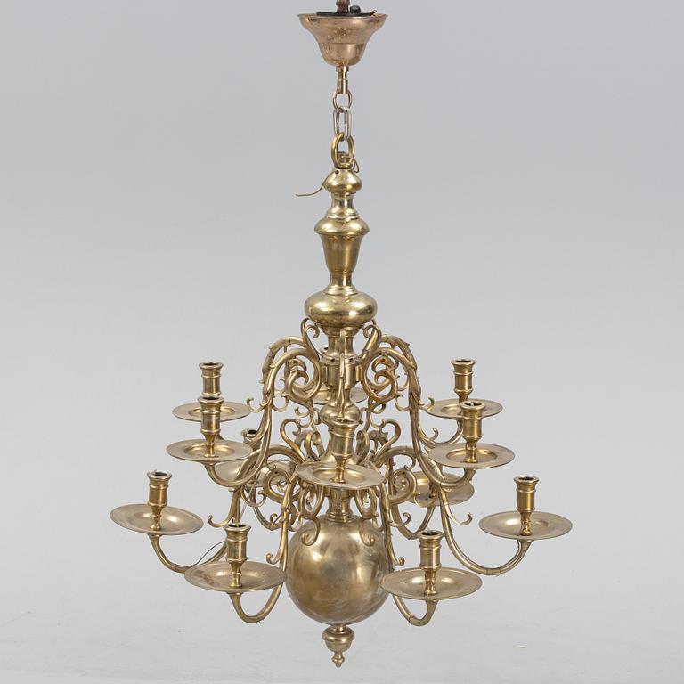 A brass Baroque style chandelier, 20th Century.