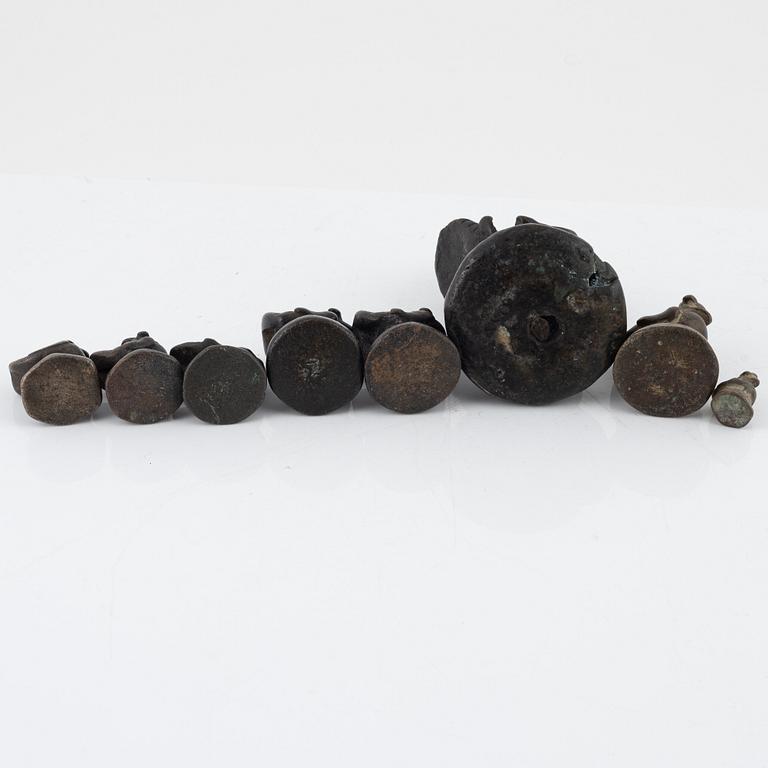 Eight bronze weights, Burma, 19th-20th century.