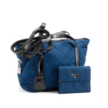 693. PRADA, a blue nylon and black leather shoulder bag and a wallet.