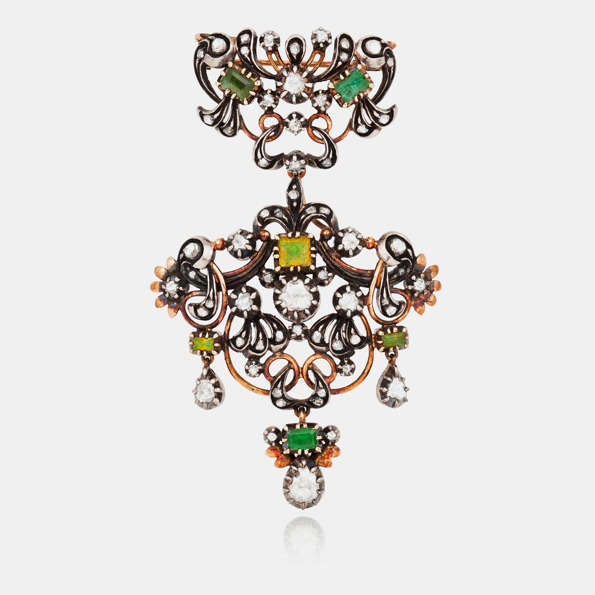 BROSCH/HÄNGE med folierat glas samt rosenslipade diamanter, 1800-tal.