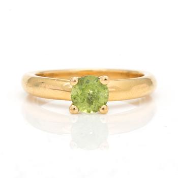 RING med fasettslipad peridot.