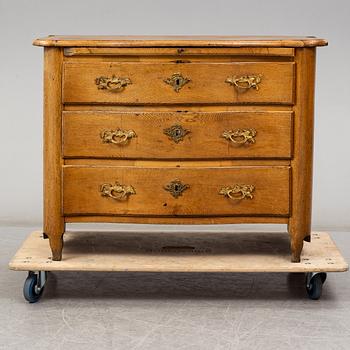 A 18th century rococo chest of drawers.