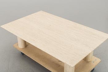 A TRAVERTINE SOFA TABLE.