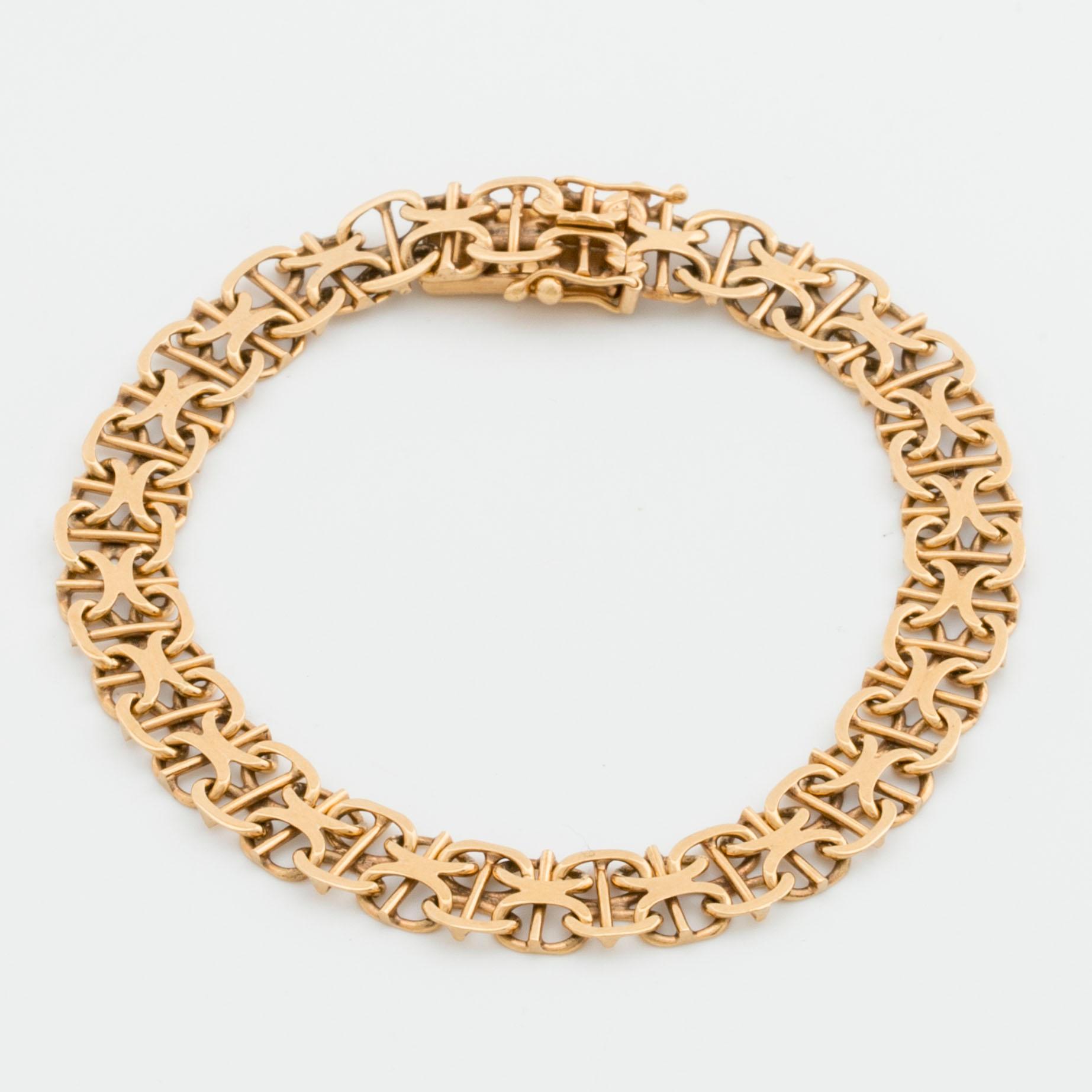 ARMBAND 18K guld x-länk med stav, Stockholm 1968.