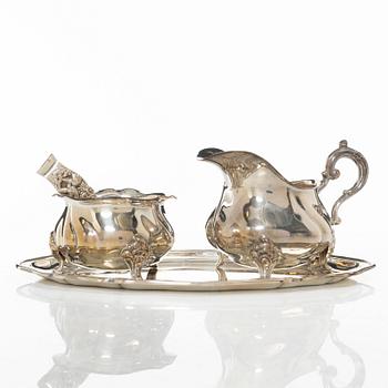Wilhelm T Binder, sugar bowl, creamer, tray and sugar tong, silver, Schwäbisch Gmünd, Germany, 20th century.