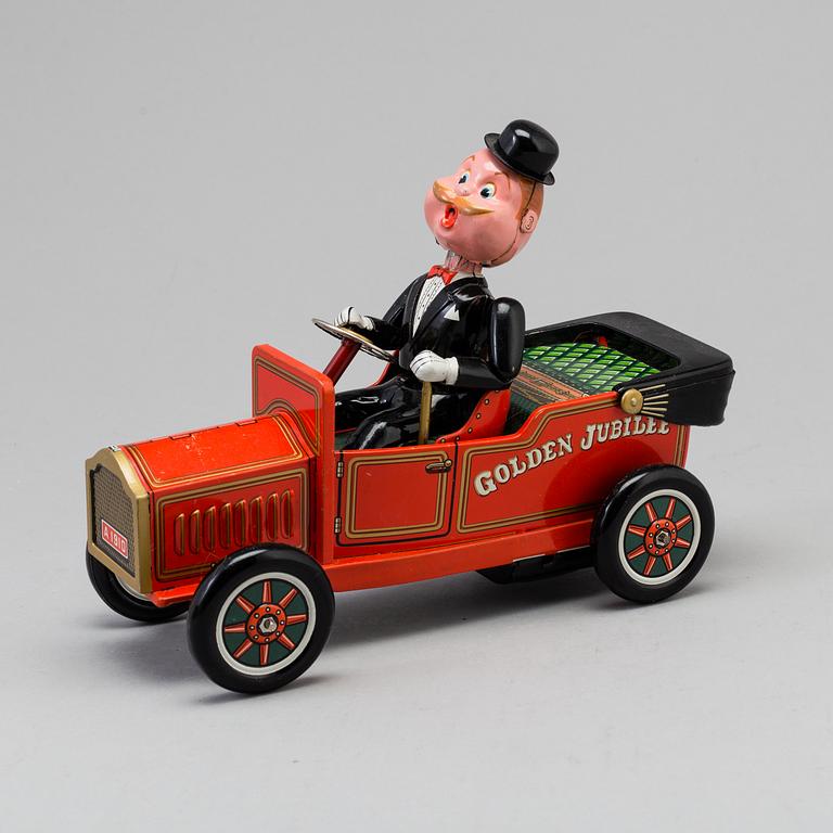 A toy metal car "Sunday Driver", Kosuge, Japan, and "Giant Helicopter", YF, Japan. 1960s.