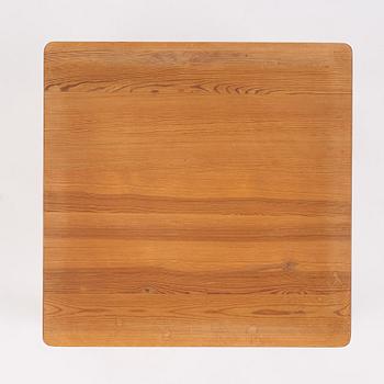 Axel Einar Hjorth, a stained pine "Värmdö" table, Nordiska Kompaniet, Sweden, 1930s.