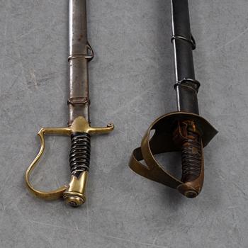 Two Swedish 19th Cenury military swords with scabbards.
