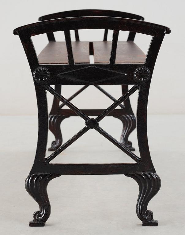 A Folke Bensow black lacquered cast iron and wood park bench, Näfveqvarns Bruk.