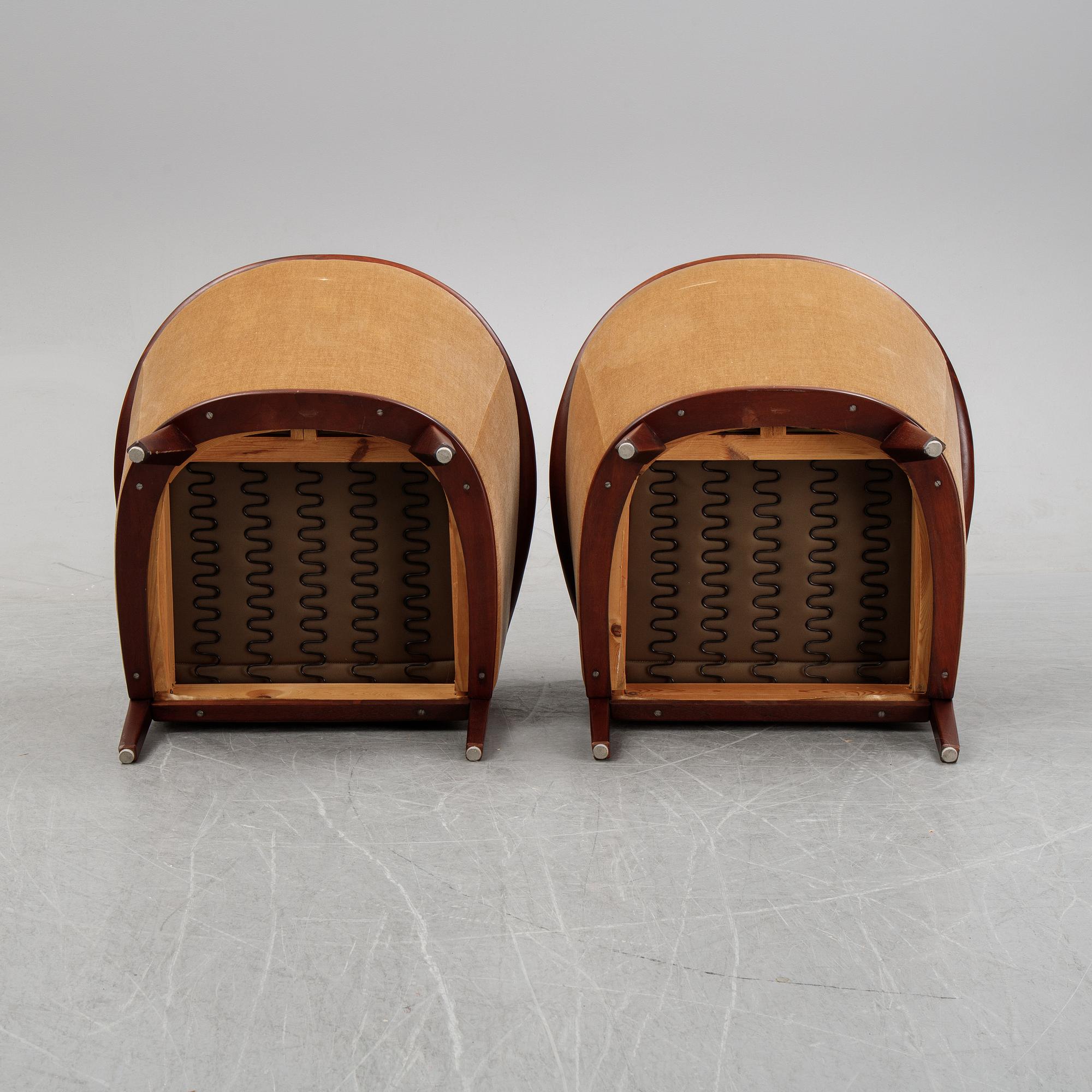 A pair of mahogany and velvet easy chairs by Bröderna Andersson, 1960's.