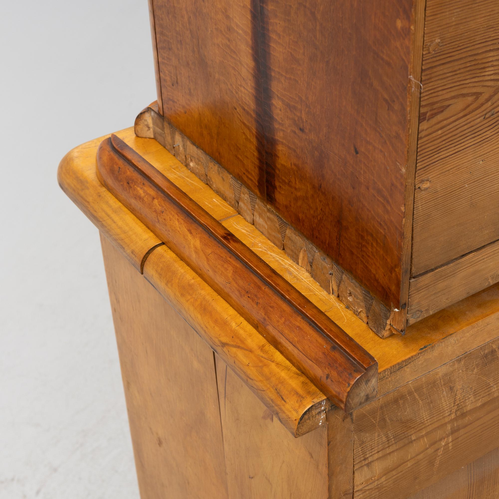 A birch wood veneered book cabinet early 20th Century.