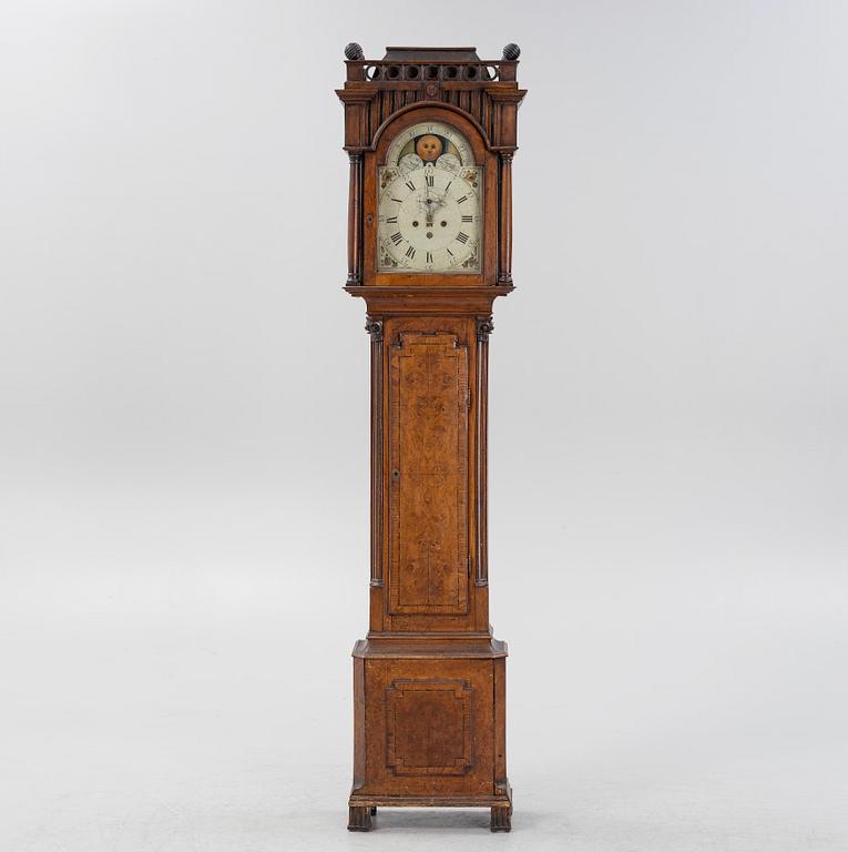 An oak longcase clock, 19th Century.