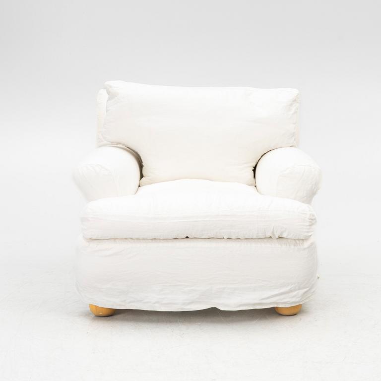 An armchair, contemporary.