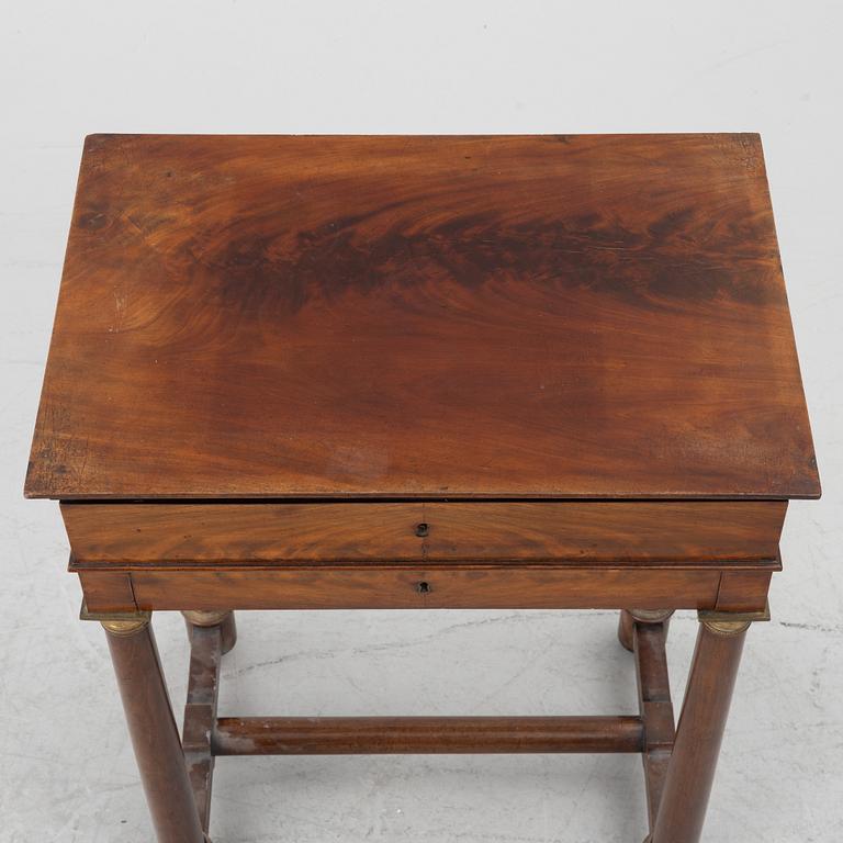 A French Empire mahogany sewing table, first part 19th century.