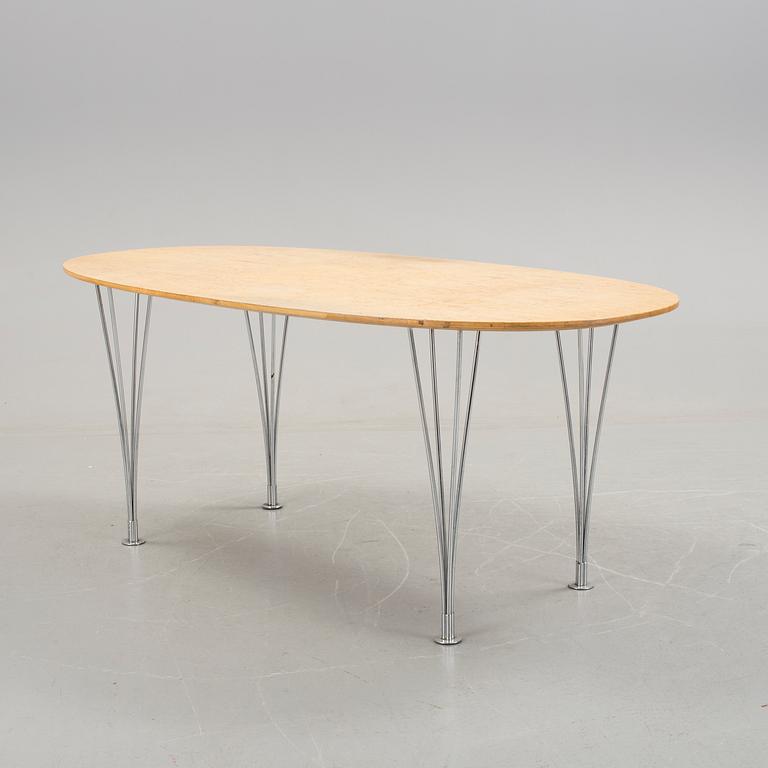 A table "Superellips" by Bruno Mathsson for Fritz Hansen.