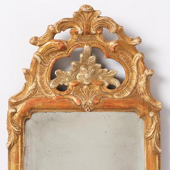 A pair of giltwood one-branch girandole mirrors by JP Larsson.