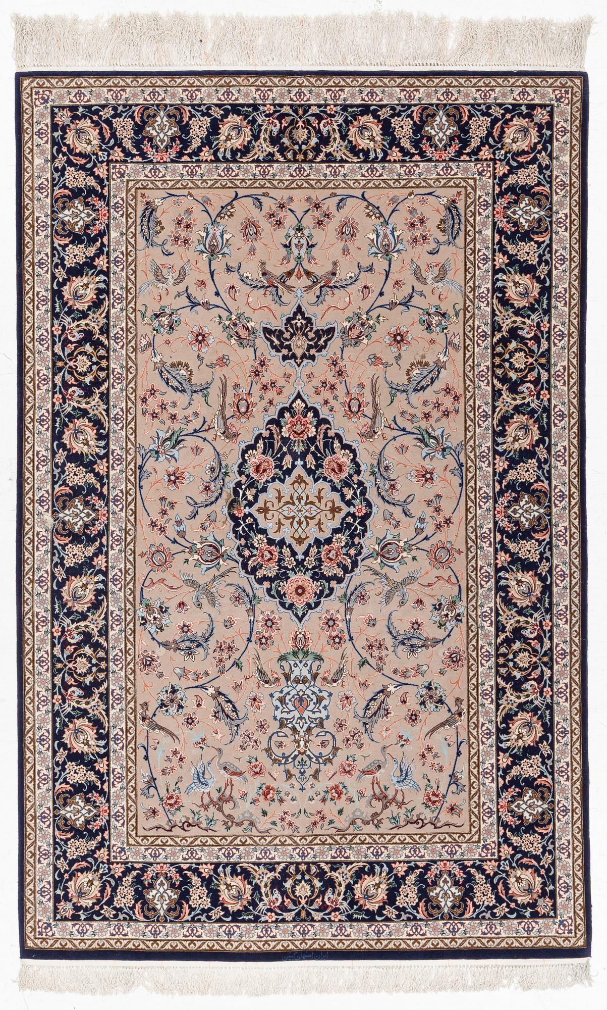 An Isfahan rug, c. 220 x 145 cm.