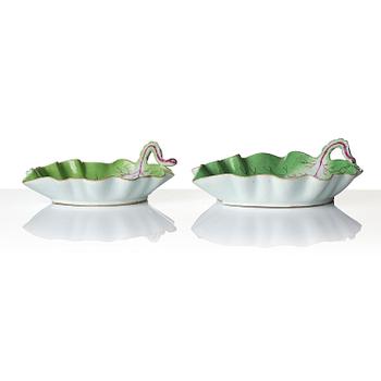 A pair of leaf shaped 'European subject' dishes, Qing dynasty, 18th century.