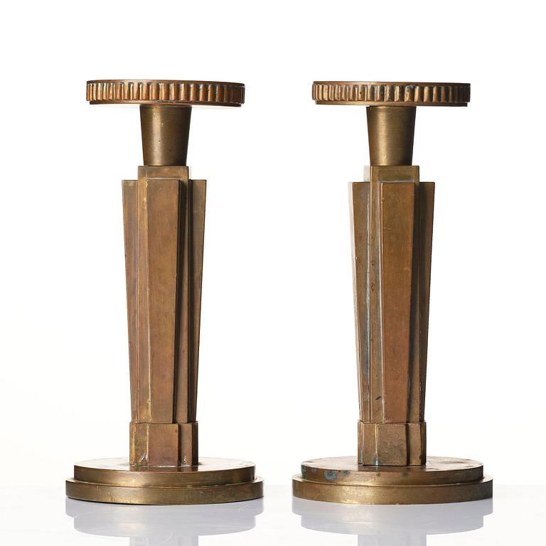 Lars Holmström, a pair of brass candlesticks, Arvika, Swedish Grace, 1920s/30s.