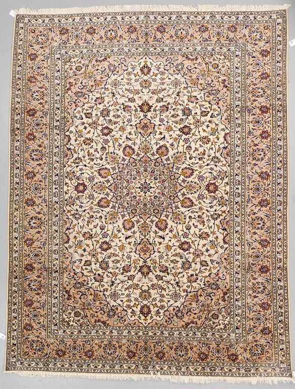 A carpet from Kashan, around 330 x 261 cm.