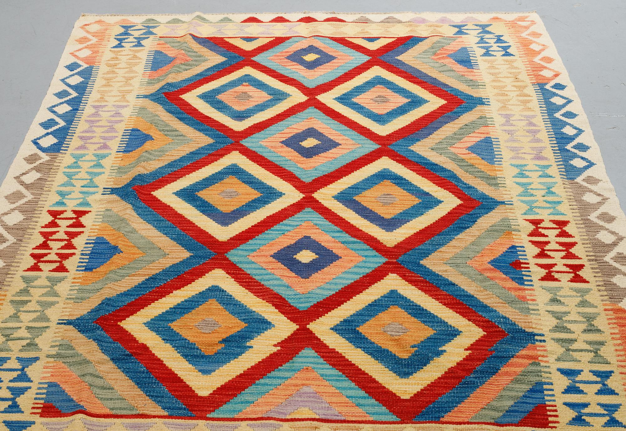 A carpet, kilim, 226 x 171 cm.
