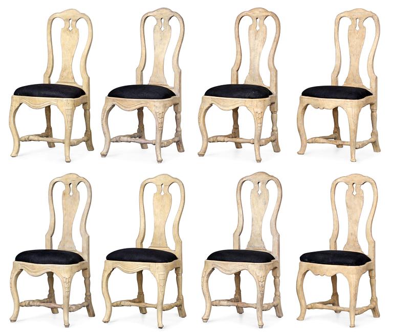 Eight matched Swedish Rococo chairs.