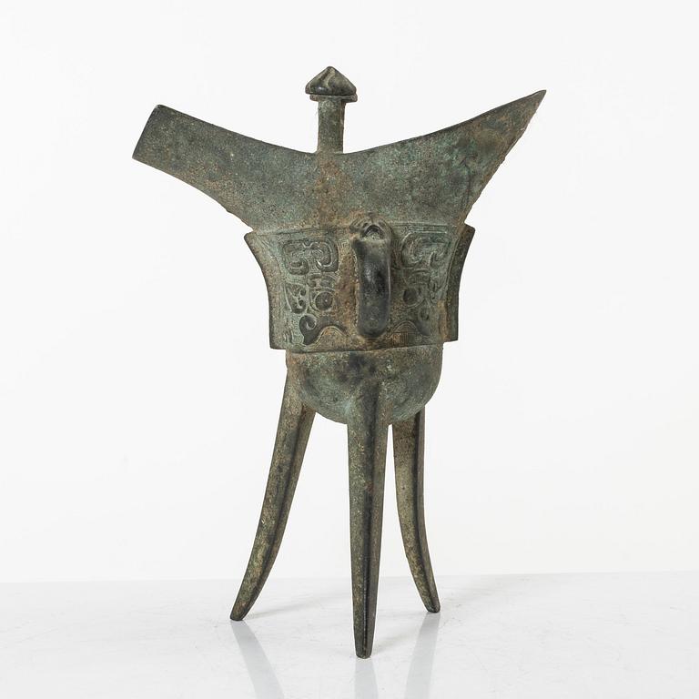 An archaisitic bronze Jue vessel, Qing dynasty.