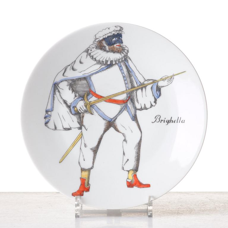 Piero Fornasetti, a set of 12 "Maschere Italiane" porcelain plates, Milan, Italy.