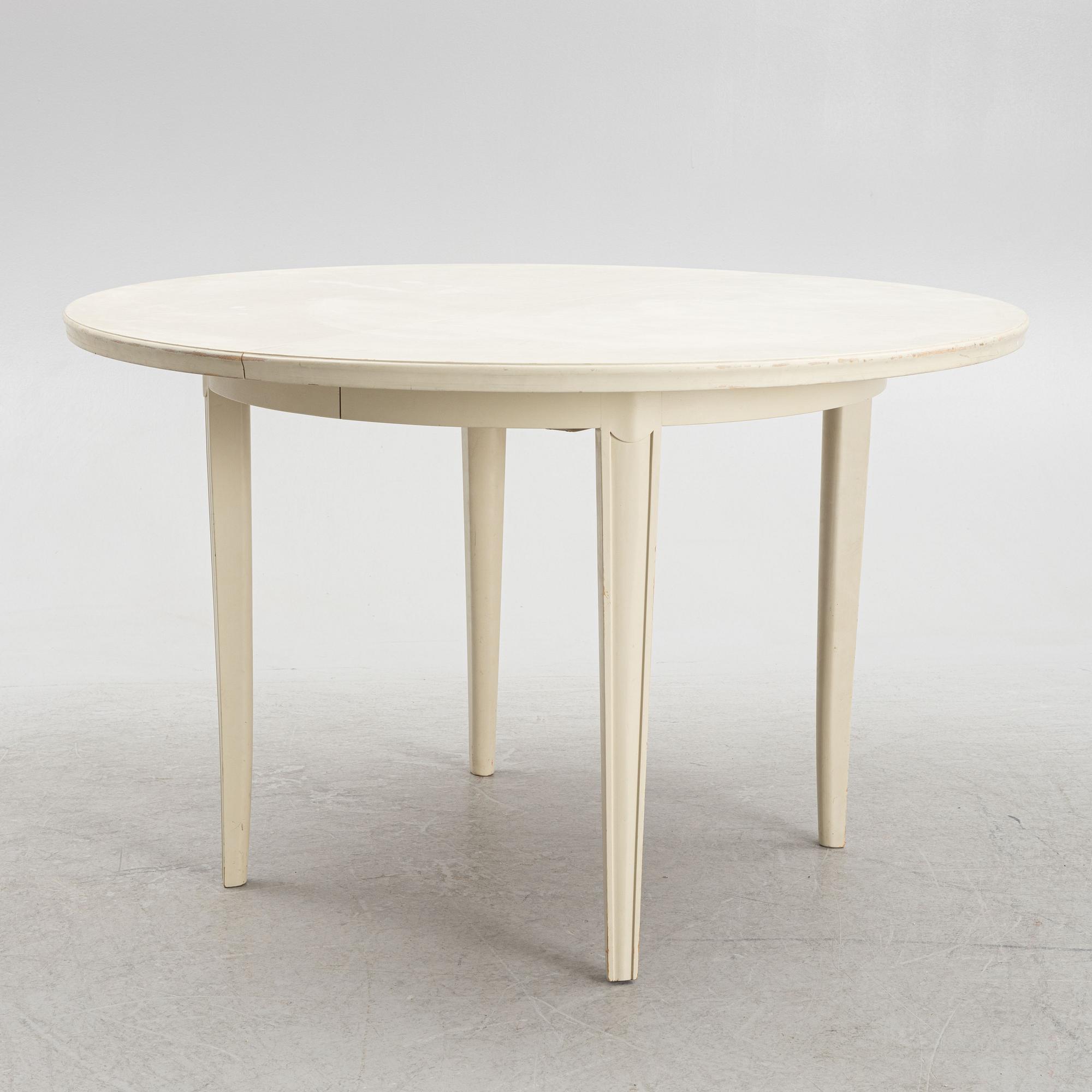 Carl Malmsten, six 'Juni' chairs and a dining table, second half of the 20th Century.