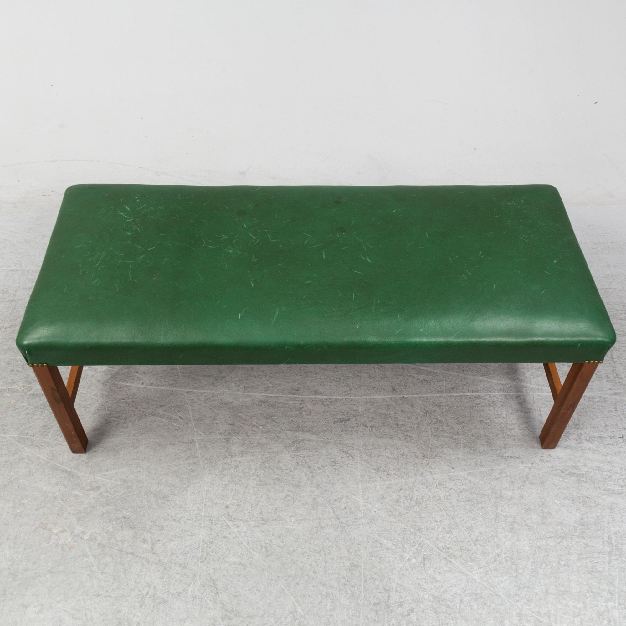 A bench "2082" by Josef Frank for Firma Svenskt Tenn.