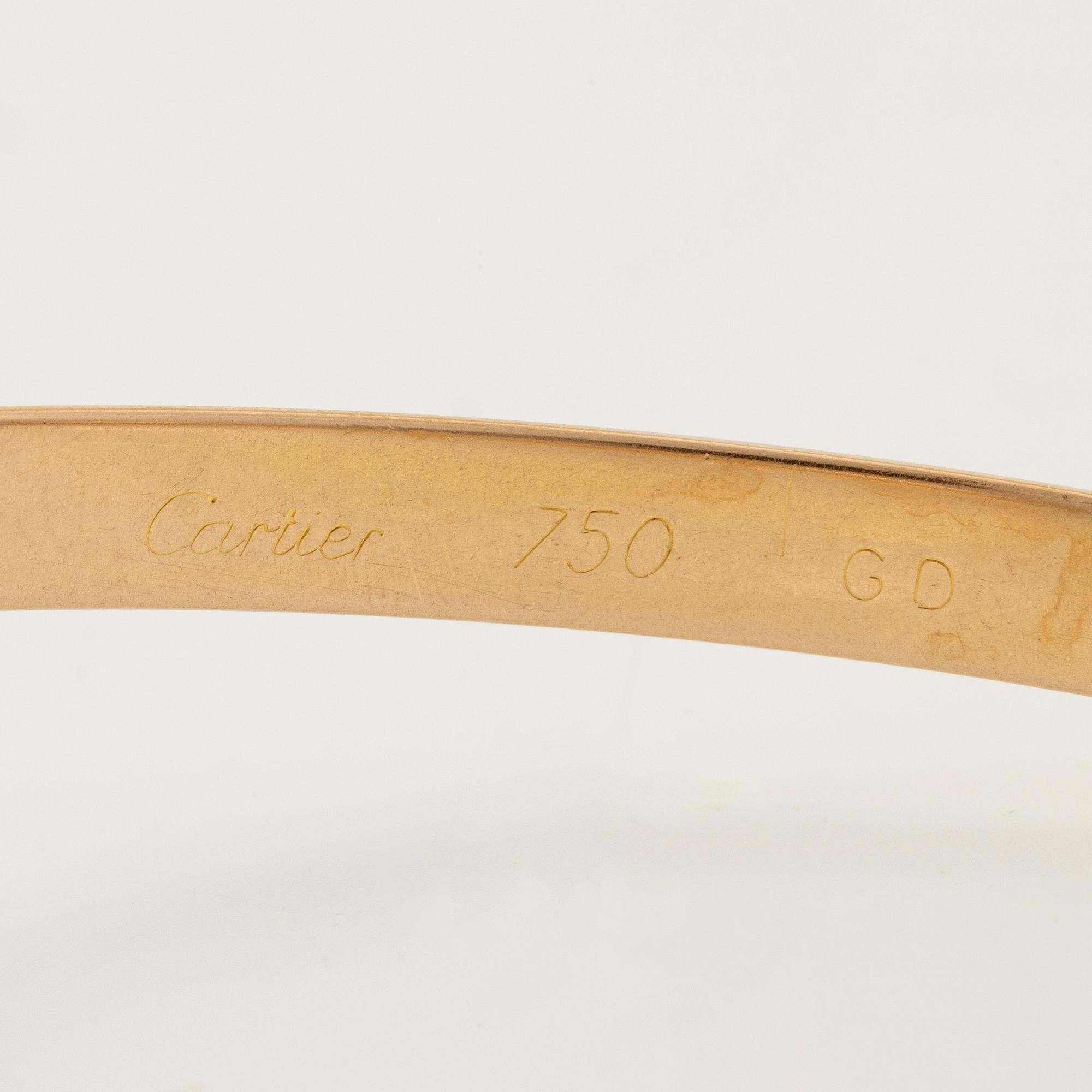 A Cartier bracelet "Trinity" 18K gold in three colours.