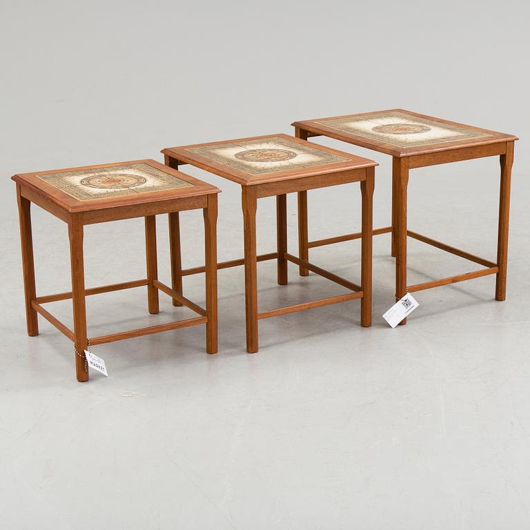 A nest of three 1960/70s tables.